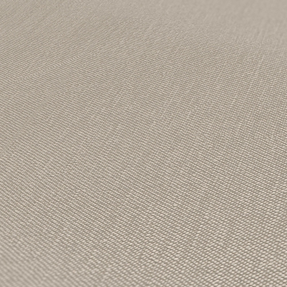             Single-coloured non-woven wallpaper with textured effect - brown
        