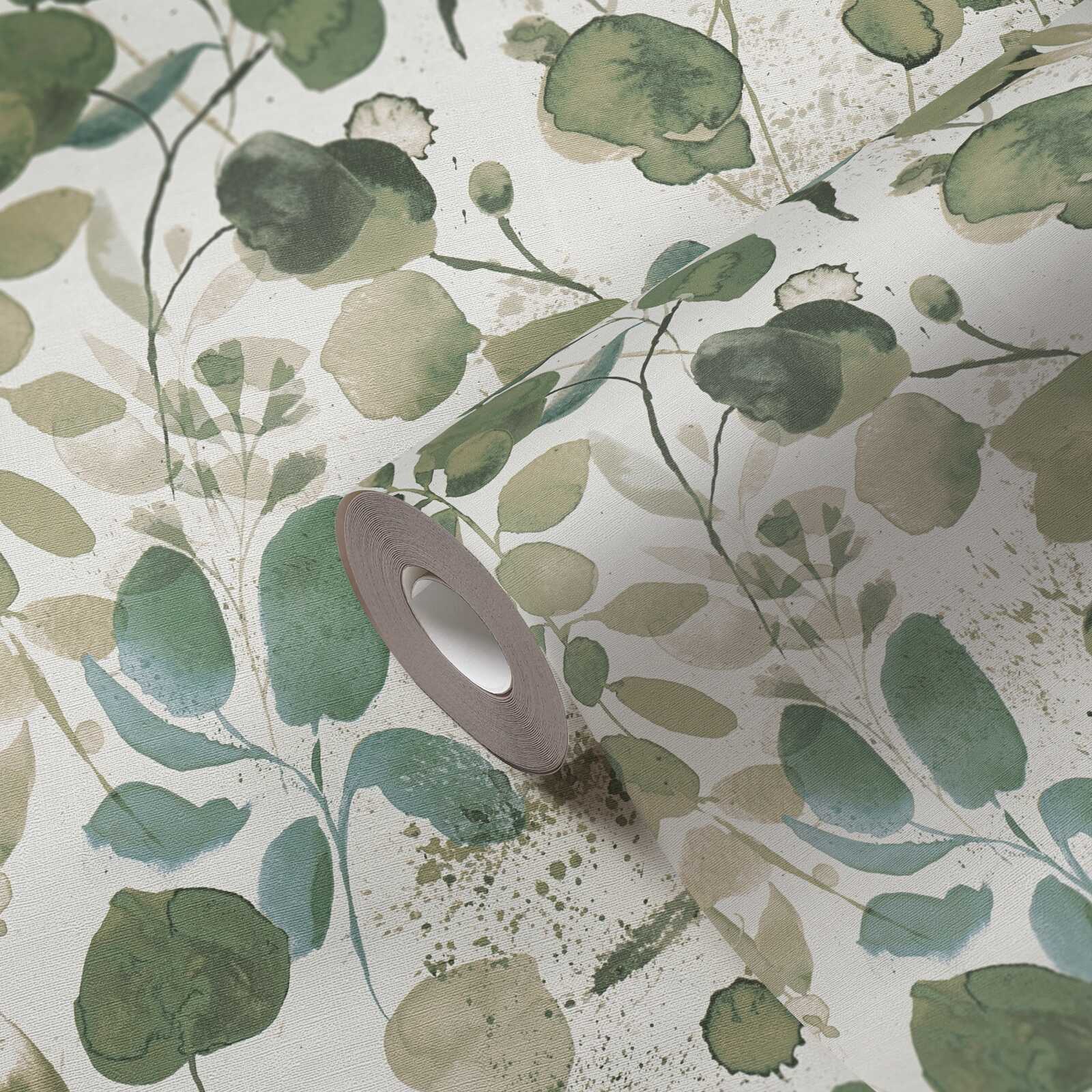             Non-woven wallpaper leaf motif with splashes of colour accents - green, blue, white
        