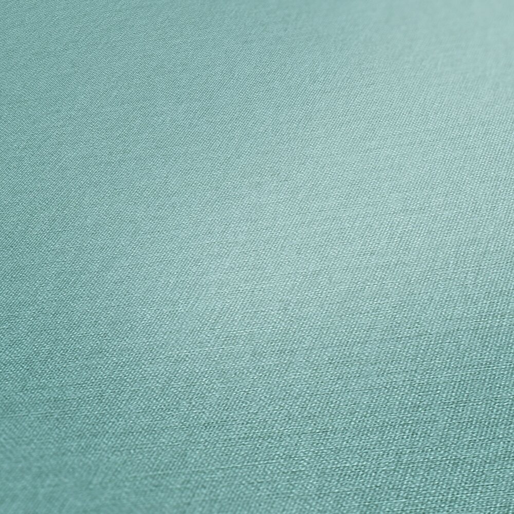             Single-coloured non-woven wallpaper with a light textile look - Blue
        