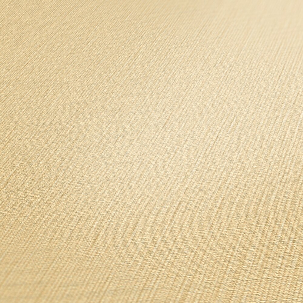             Papel pintado liso no tejido con diseño de tela en un tono sencillo: beige, amarillo, dorado
        