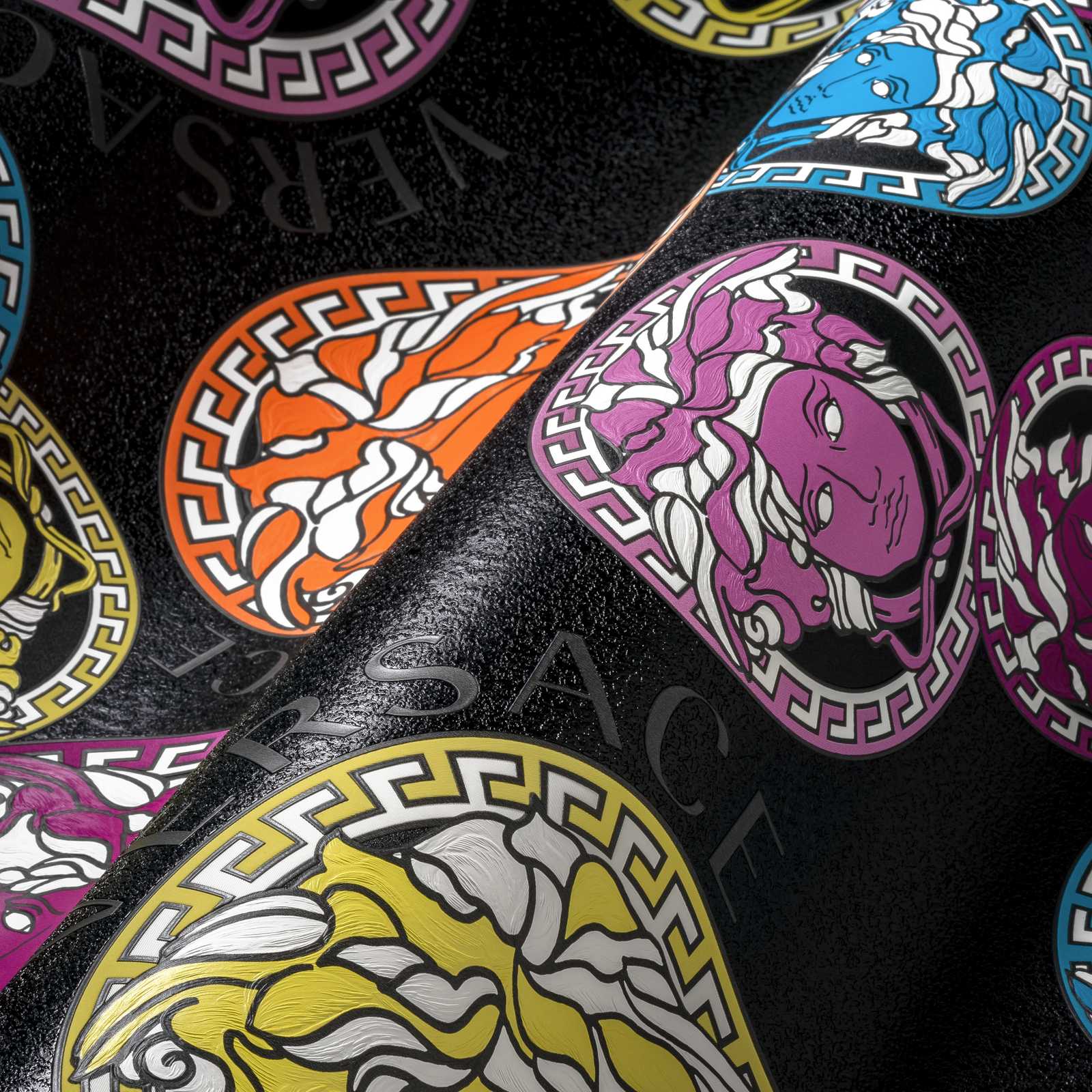             Black VERSACE wallpaper with colourful Medusa pattern
        