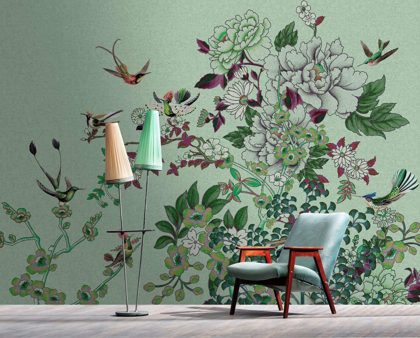             Fotomural »madras 1« - Motivo de flores verdes con pájaros sobre textura de papel kraft - Tela no tejida de textura ligera
        