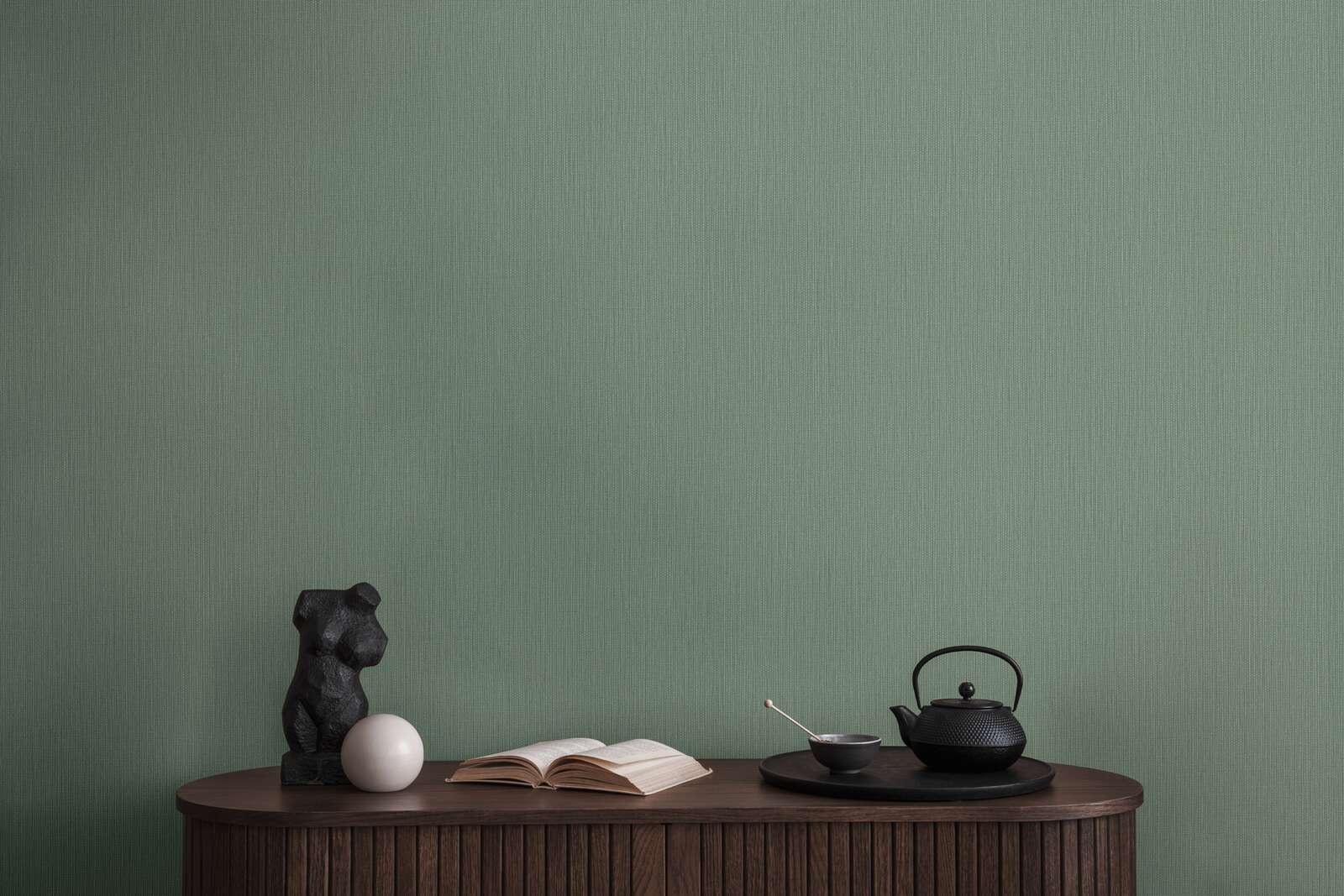             Non-woven wallpaper in a single colour with a woven look - green
        