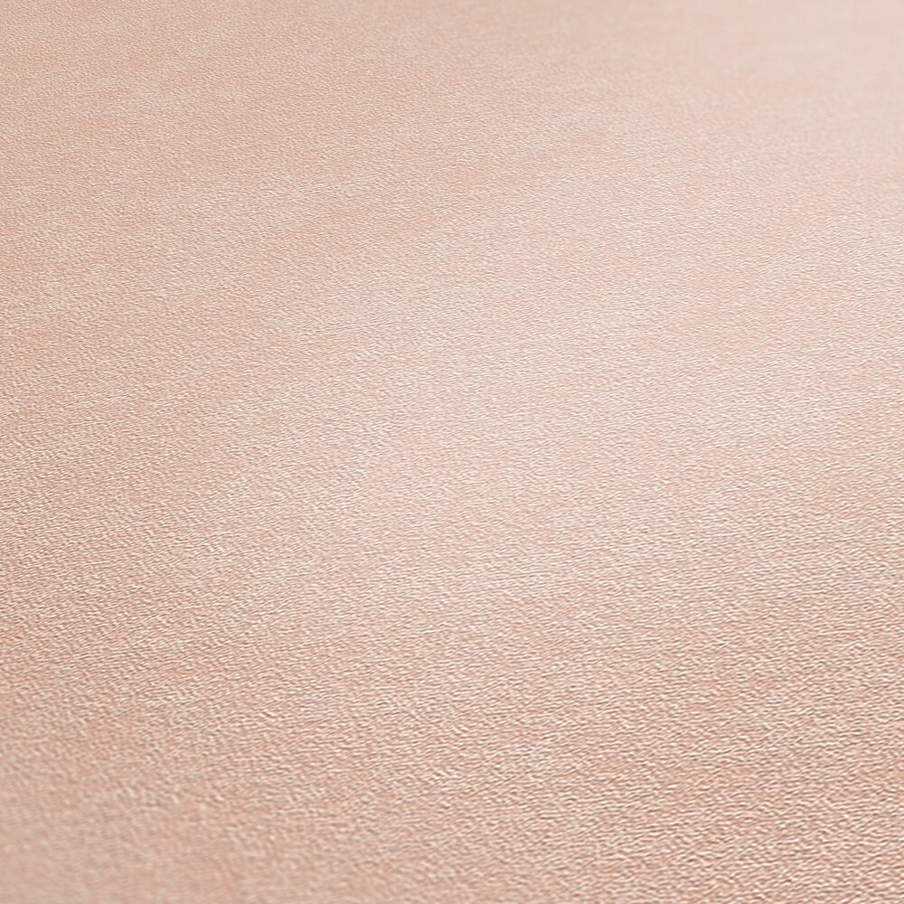             Plain-coloured non-woven wallpaper with a subtle texture - Pink
        