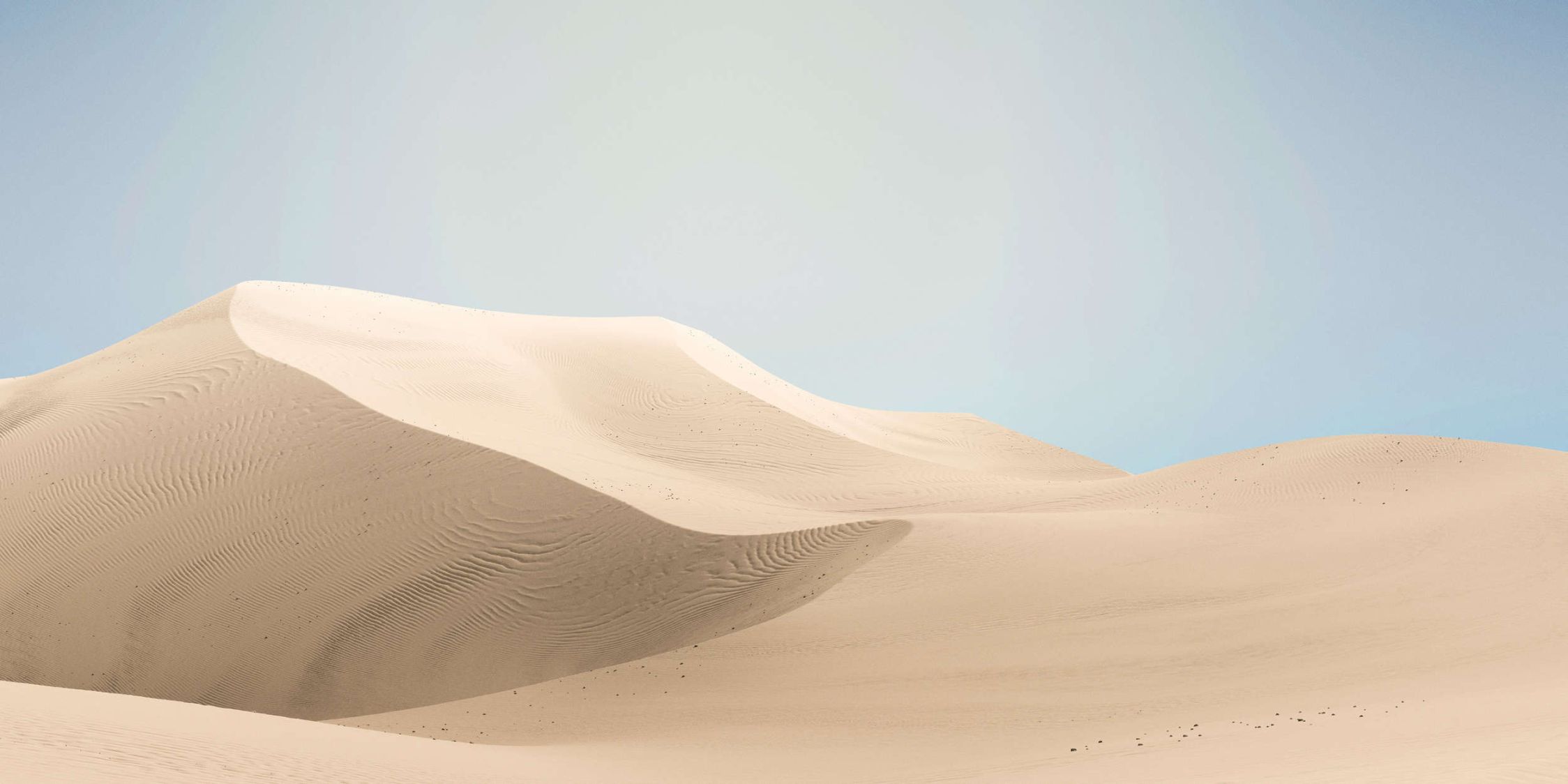             papier peint en papier panoramique »dunes« - paysage désertique aux couleurs pastel - intissé lisse aux reflets légèrement nacrés
        
