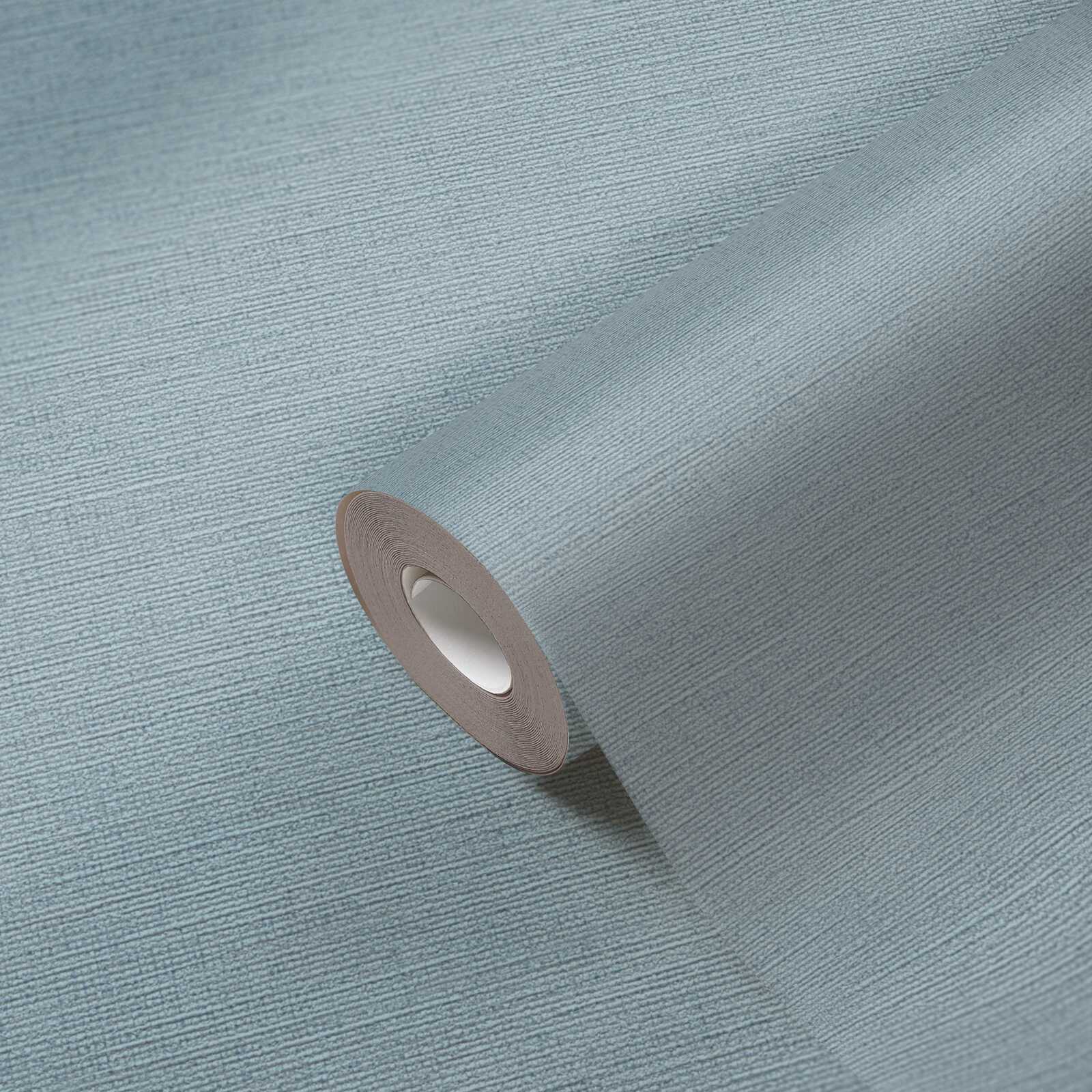             Papier peint aspect lin bleu clair avec aspect textile style scandi
        