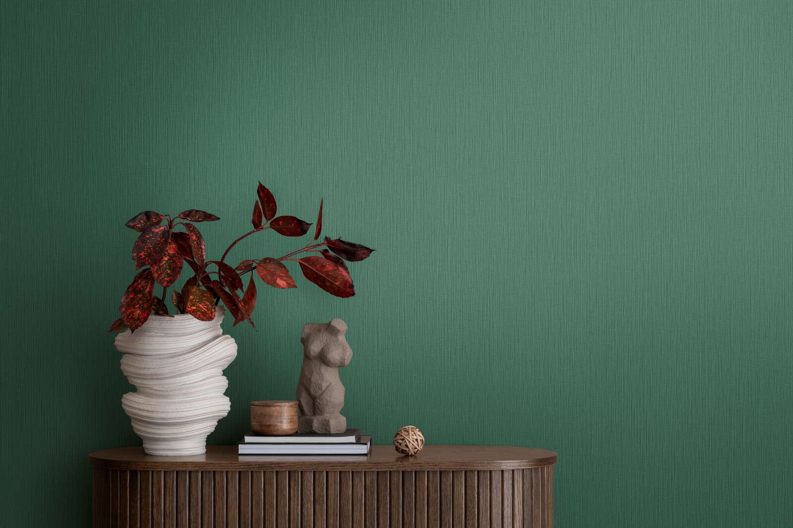             Single-coloured non-woven wallpaper with a textured effect in a dark shade - Green
        