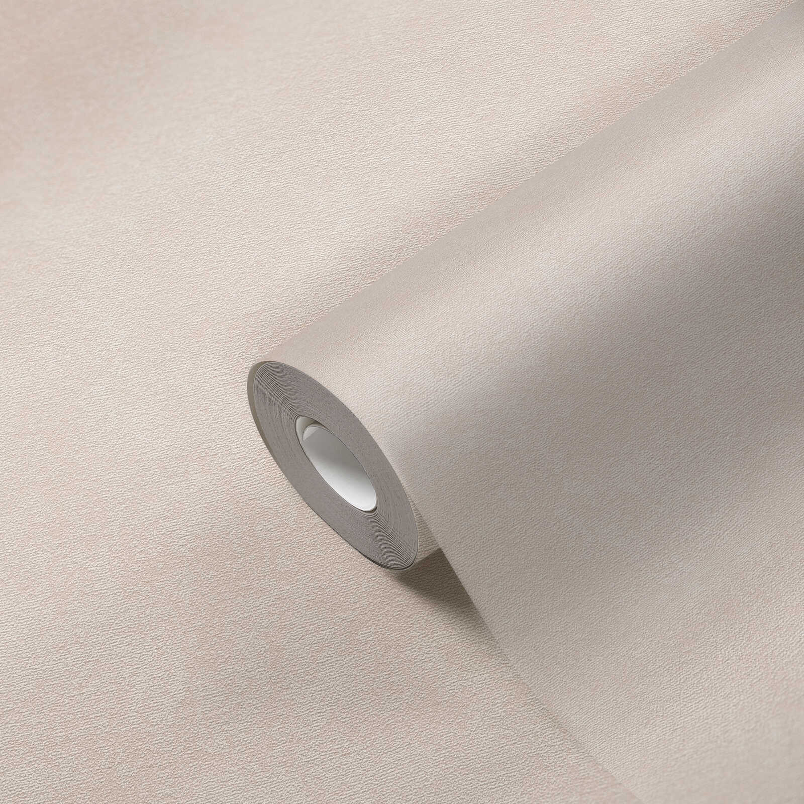             Plain-coloured non-woven wallpaper with a subtle texture - Pink
        