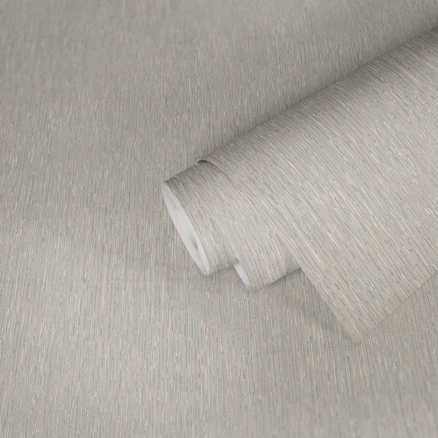             Melange wallpaper grey with metallic accents
        