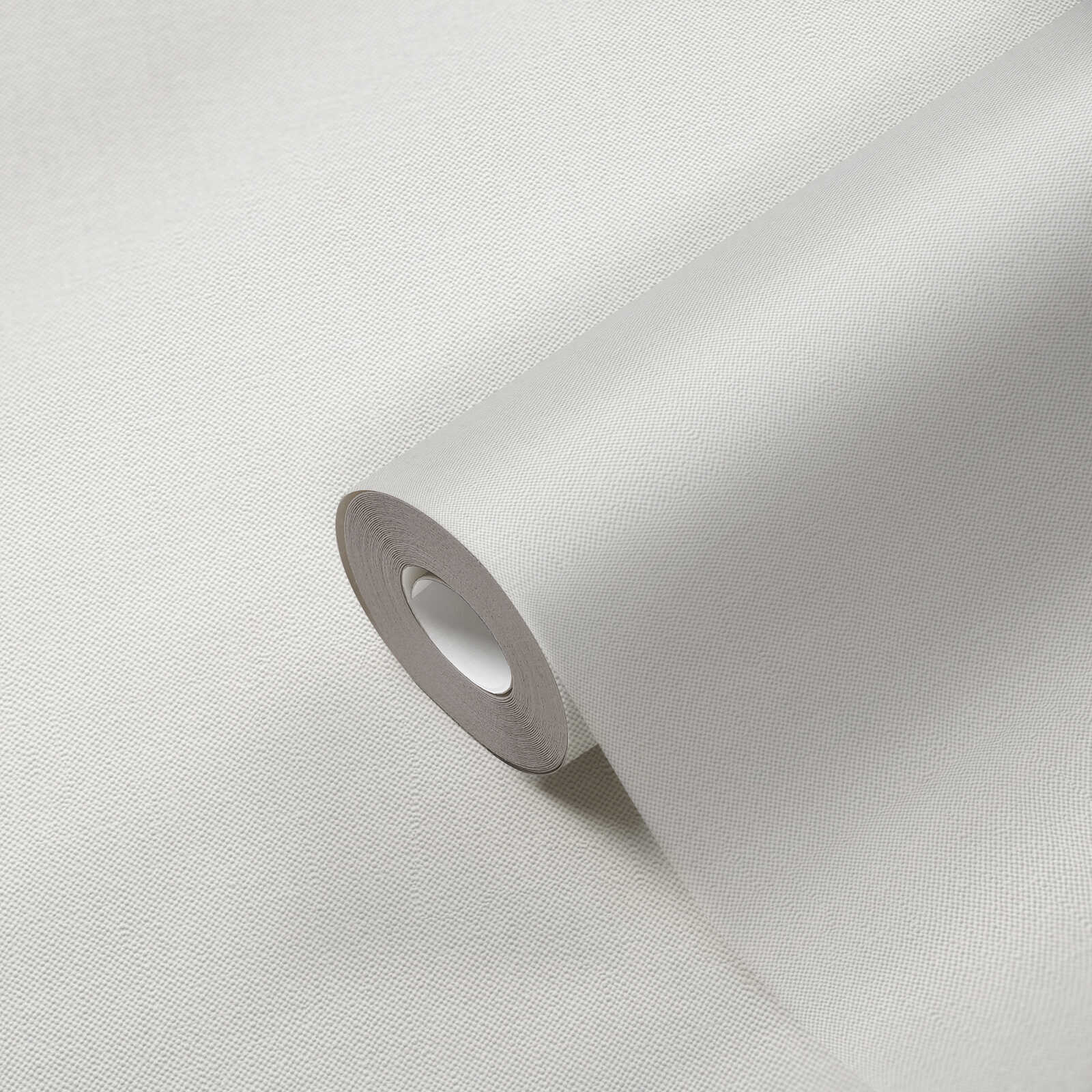             Papel pintado monocolor de tejido-no-tejido con aspecto textil - crema
        