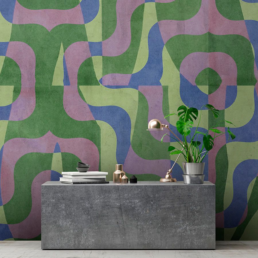 Fotomural »viola« - Motivo abstracto retro delante de un enlucido de hormigón - Verde, azul, violeta | Material sin tejer ligeramente texturado
