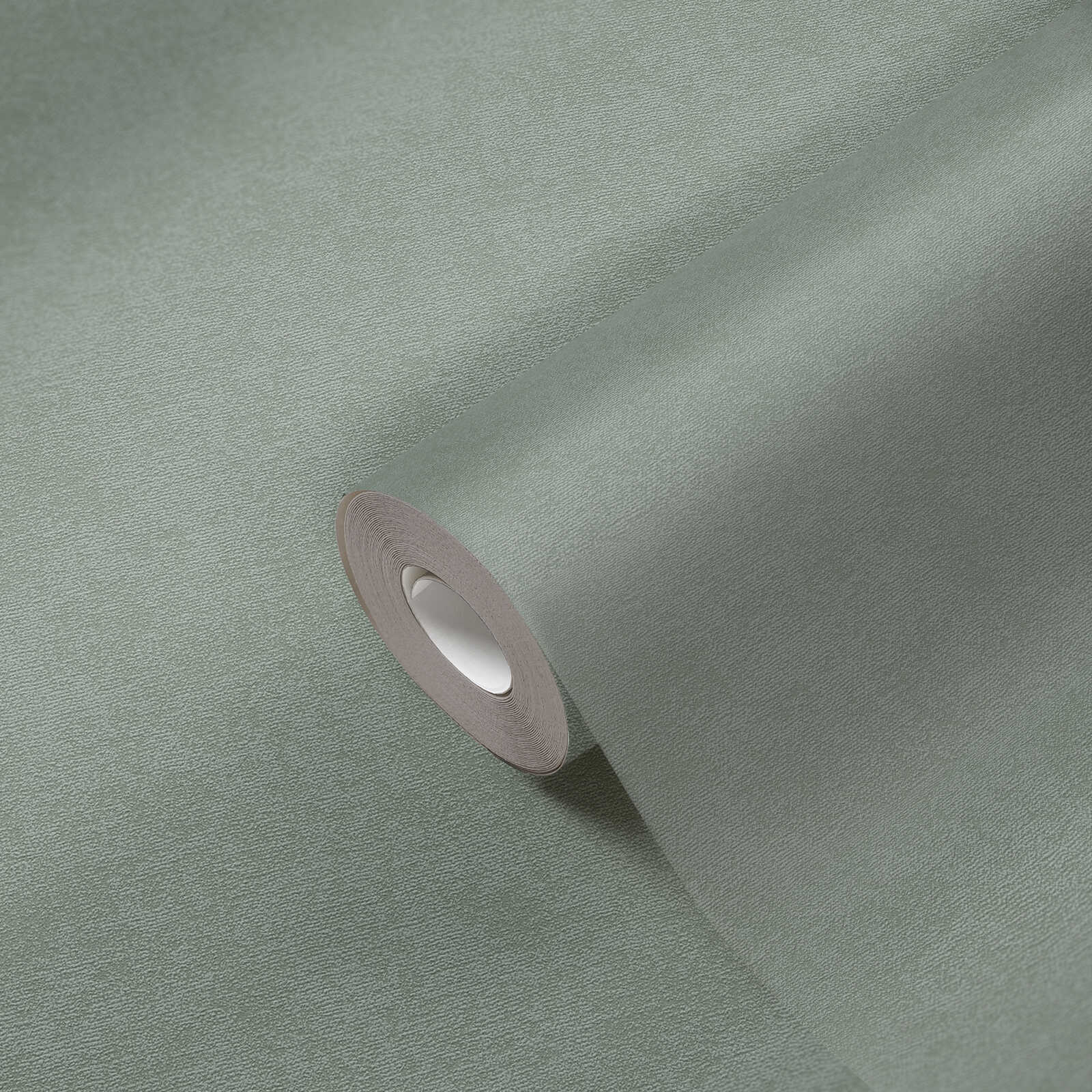             Single-coloured non-woven wallpaper with a soft texture - Green
        