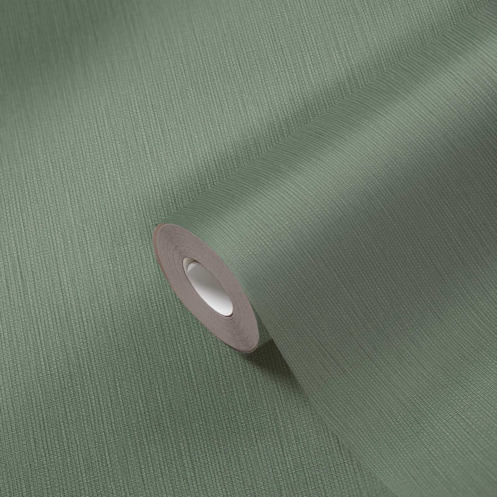             Non-woven wallpaper in a single colour with a woven look - green
        