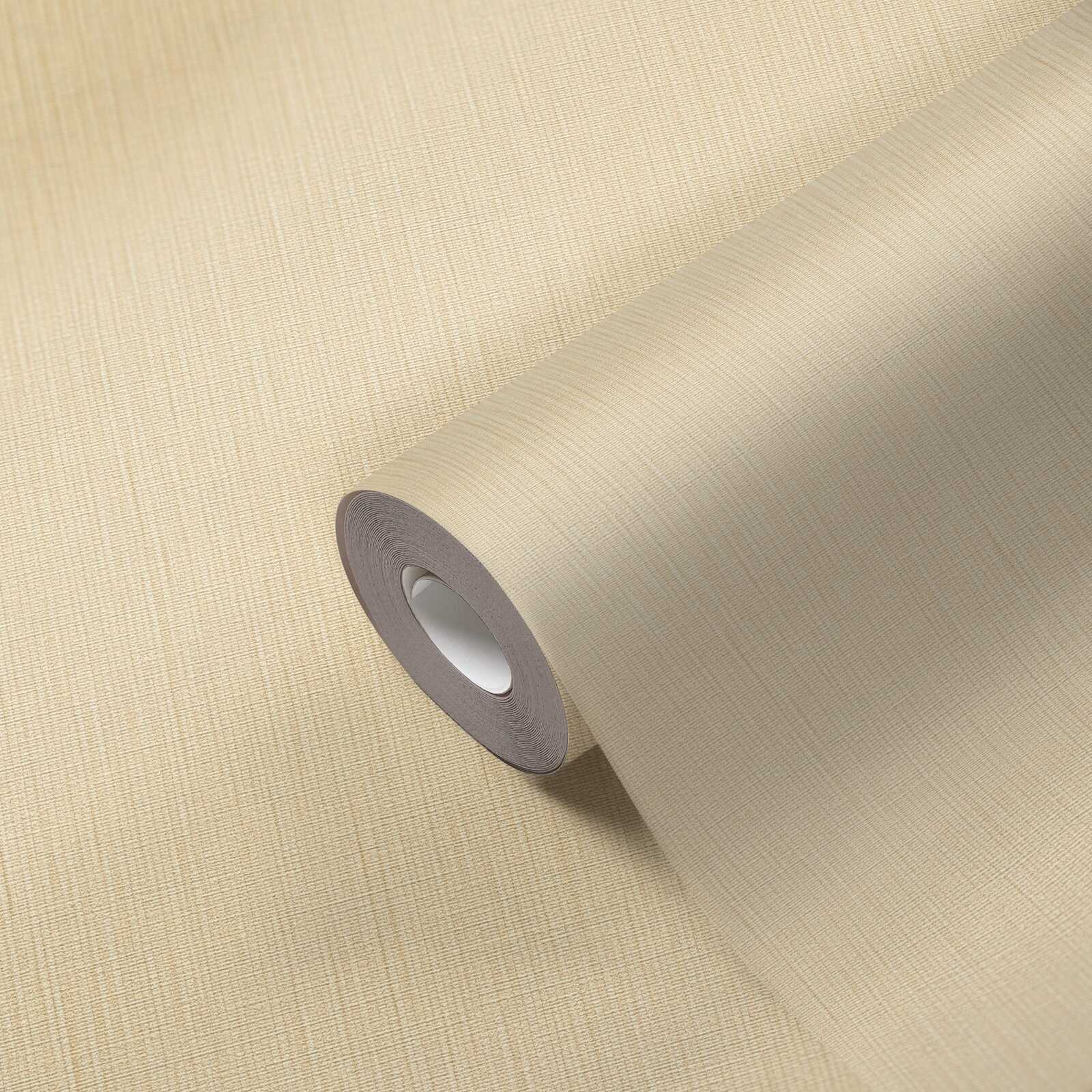             Papel pintado liso no tejido con diseño de tela en un tono sencillo: beige, amarillo, dorado
        